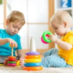 children-playing-together-toddler-kid-baby-play-blocks-educational-toys-preschool-kindergarten-child-little-boys-84680323